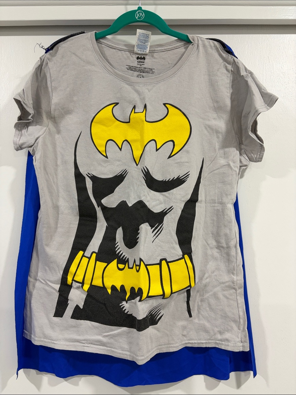 Gray Bat Girl Graphic Tee costume shirt with Yellow Emblem and Blue Cape